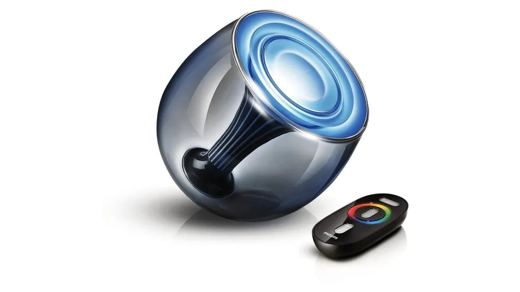 Philips Living Color-lamp met blauwe verlichting en afstandsbediening.