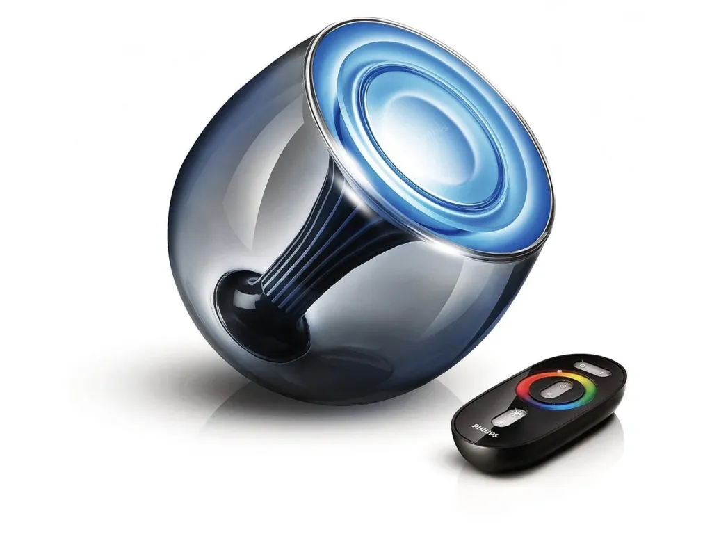 Philips Living Color-lamp met blauwe verlichting en afstandsbediening.