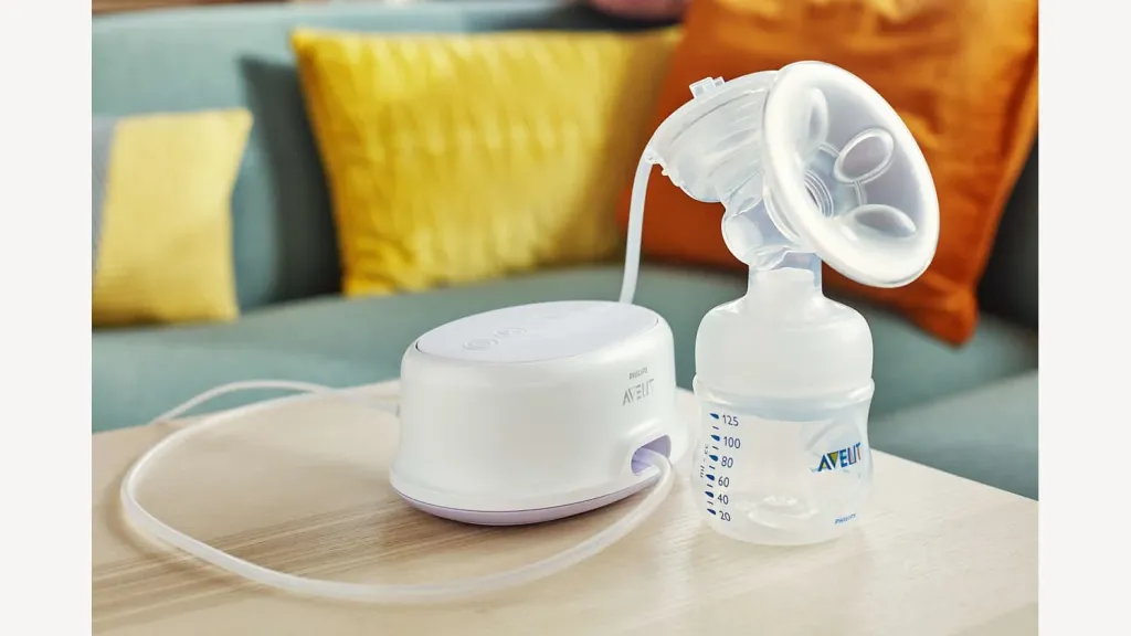 Philips Avent pump unit with tube, breast shield and collection bottle.