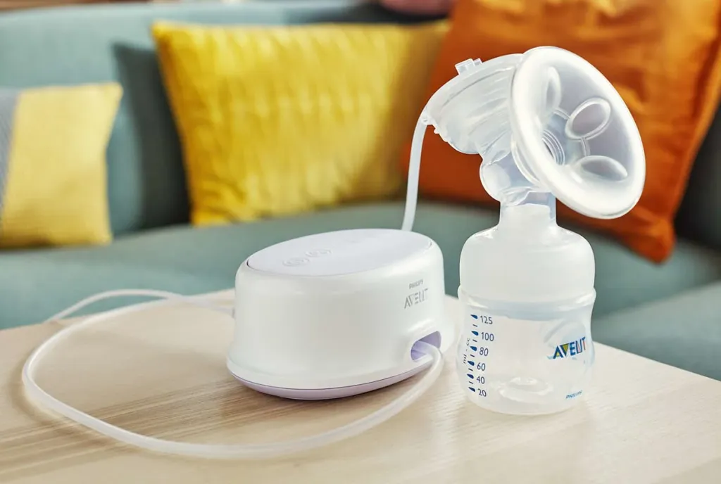Philips Avent pump unit with tube, breast shield and collection bottle.
